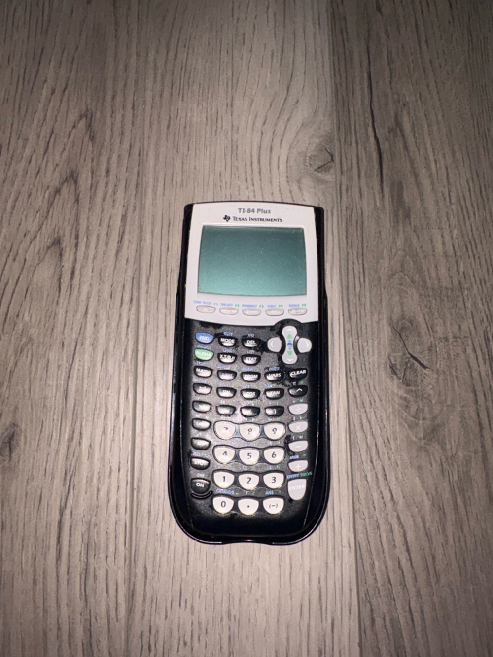 Texas Instruments TI-84 Plus Graphing Calculator - Black & White Face